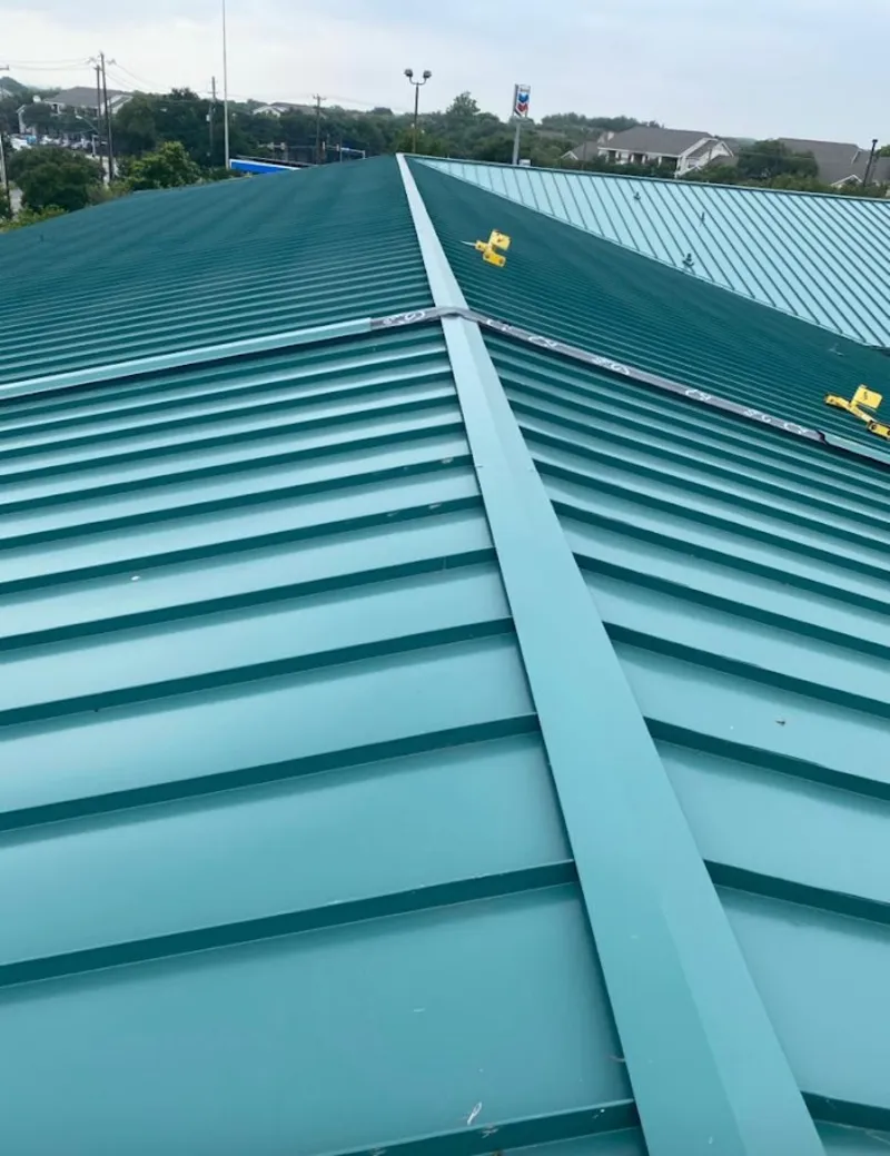 Green commercial metal roof ridge and valley for Metal Roof Repair in Granbury