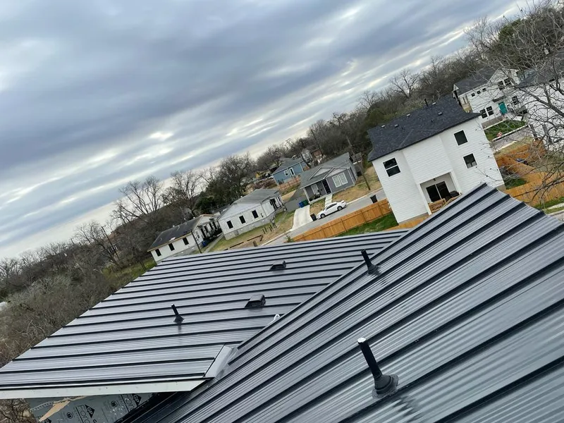 Standing seam metal roof panels with vents for Skylight Repair in Granbury